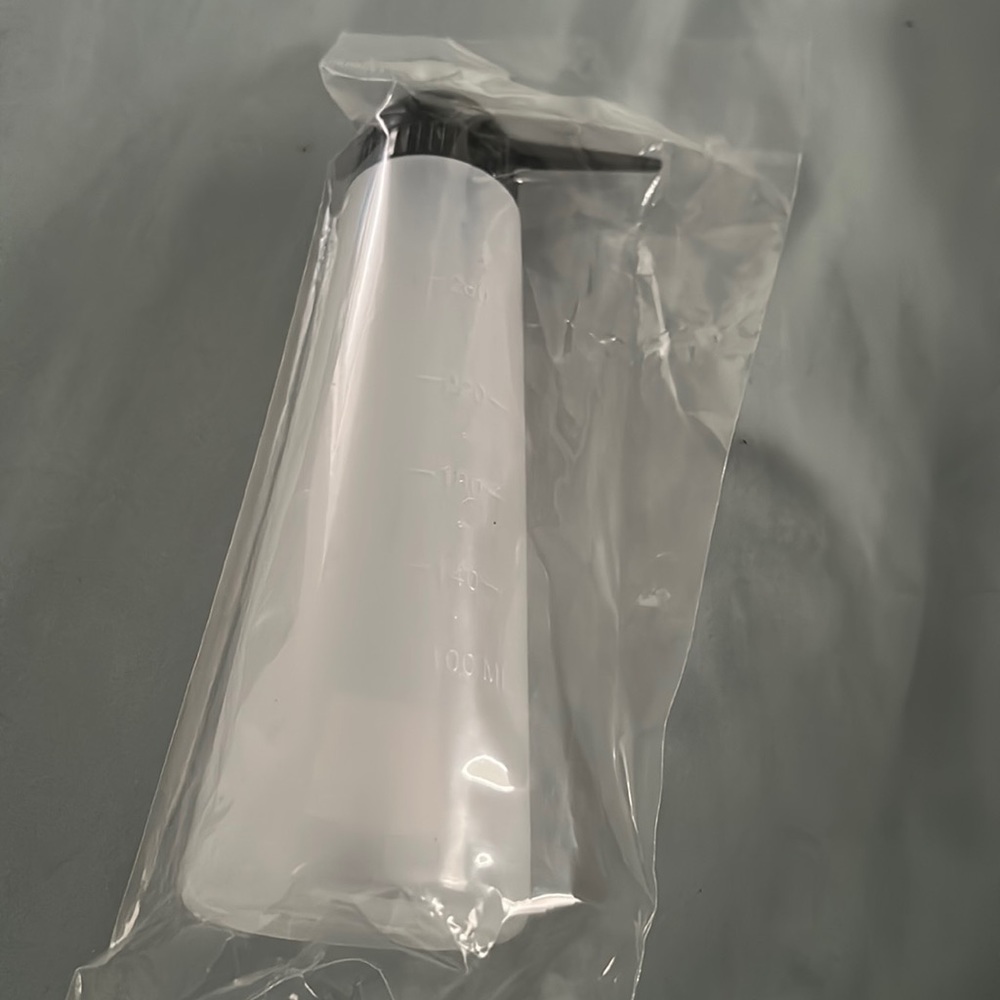 Hair color applicator bottle